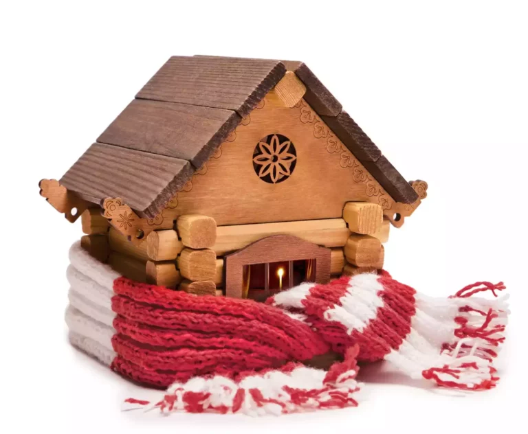 A wooden house wrapped in a warm knitted scarf Isolated on a white background with premium roof insulation solutions